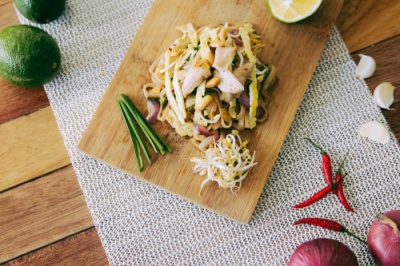 chopped food on cut board on table